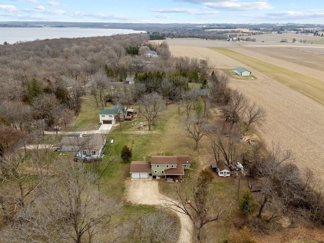 drone / aerial view featuring a rural view and a water view