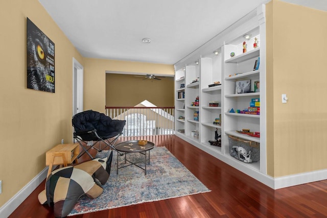 140 River Dr, Appleton, WI 54915 - sitting room with wood finished floors, a ceiling fan, baseboards, and built in shelves