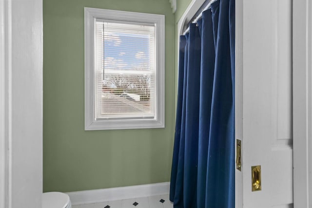 140 River Dr, Appleton, WI 54915 - bathroom with baseboards and toilet