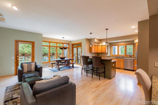 806 Stagecoach Trl, Madison, WI 53717 - living area with recessed lighting, light wood-style floors, a healthy amount of sunlight, and baseboards