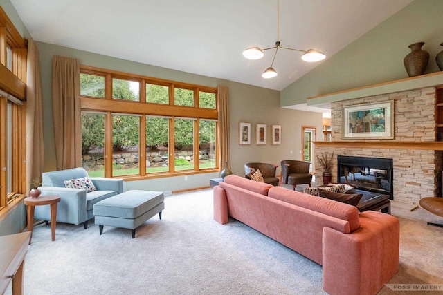 806 Stagecoach Trl, Madison, WI 53717 - carpeted living room featuring a fireplace, high vaulted ceiling, and a notable chandelier