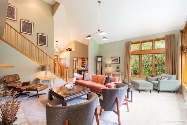 806 Stagecoach Trl, Madison, WI 53717 - living area featuring stairs, carpet flooring, high vaulted ceiling, and visible vents