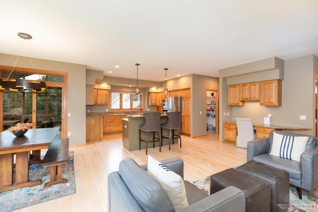806 Stagecoach Trl, Madison, WI 53717 - living room with baseboards, light wood finished floors, and recessed lighting