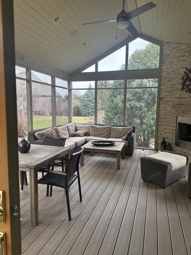 806 Stagecoach Trl, Madison, WI 53717 - sunroom with an outdoor living space with a fireplace and ceiling fan