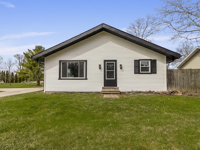 4155 Finch Ln, Delavan, WI 53115 - bungalow-style home featuring fence, entry steps, and a front yard