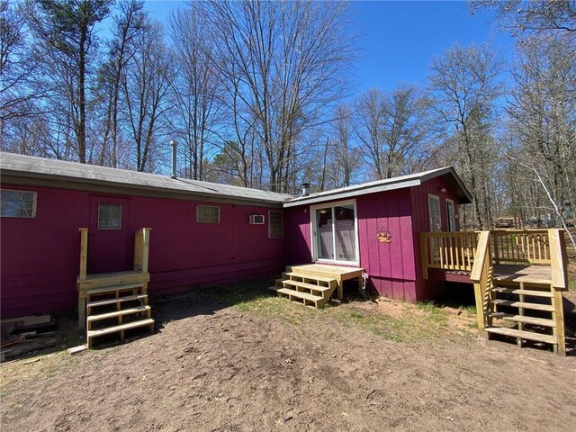 W8108 Vernon Ave, Trego, WI 54888 - rear view of house with a wooden deck