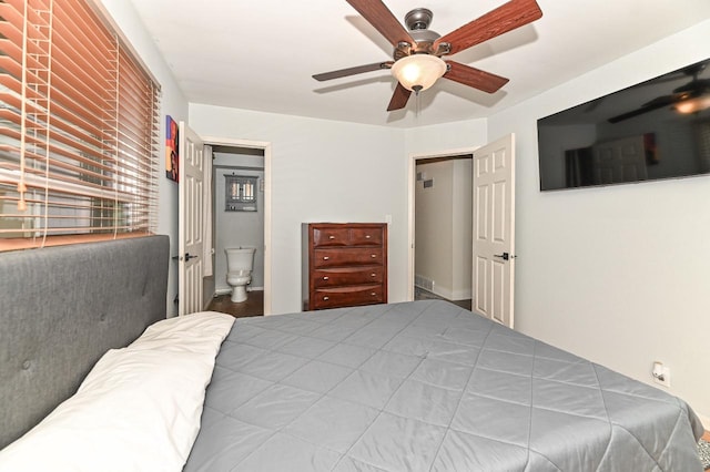 bedroom with ceiling fan and connected bathroom