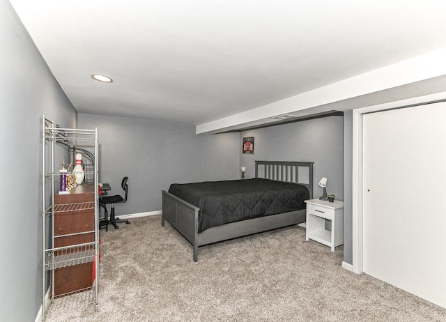 bedroom featuring baseboards, carpet flooring, and recessed lighting