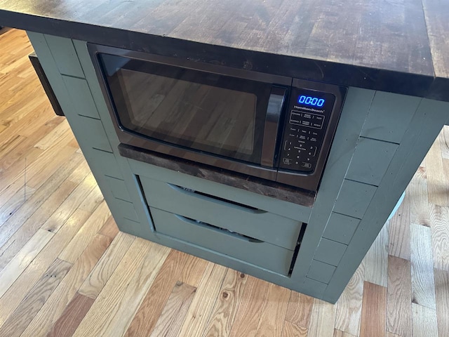details featuring wood finished floors