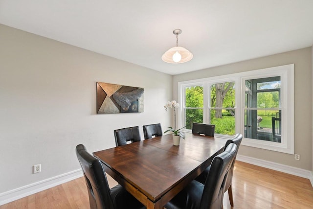 5407 Marsh Woods Dr, Mcfarland, WI 53558 - dining area with baseboards and light wood-style floors