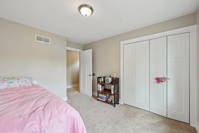 5407 Marsh Woods Dr, Mcfarland, WI 53558 - carpeted bedroom with a closet and baseboards