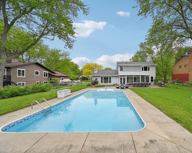 5407 Marsh Woods Dr, Mcfarland, WI 53558 - outdoor pool featuring a sunroom and a patio area