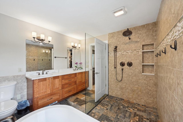 5407 Marsh Woods Dr, Mcfarland, WI 53558 - bathroom featuring walk in shower, tile walls, double vanity, toilet, and a chandelier