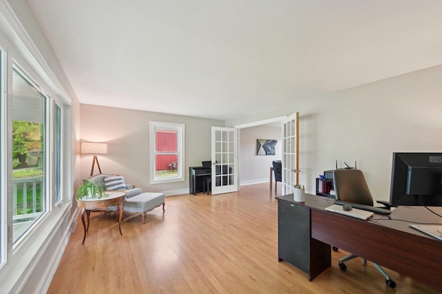 5407 Marsh Woods Dr, Mcfarland, WI 53558 - office with french doors, light wood finished floors, and baseboards