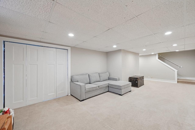 5407 Marsh Woods Dr, Mcfarland, WI 53558 - carpeted living room with recessed lighting, stairs, and a paneled ceiling