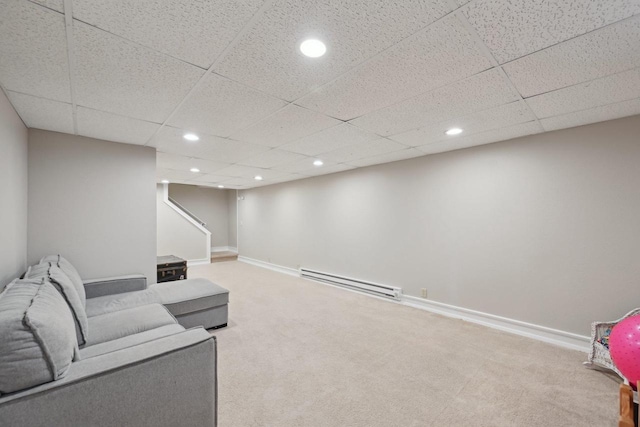 5407 Marsh Woods Dr, Mcfarland, WI 53558 - living area with baseboard heating, carpet flooring, recessed lighting, a drop ceiling, and stairway