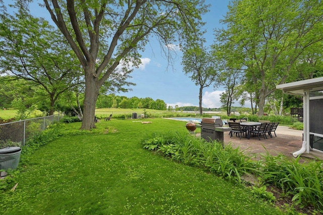 5407 Marsh Woods Dr, Mcfarland, WI 53558 - view of yard featuring a patio and a water view