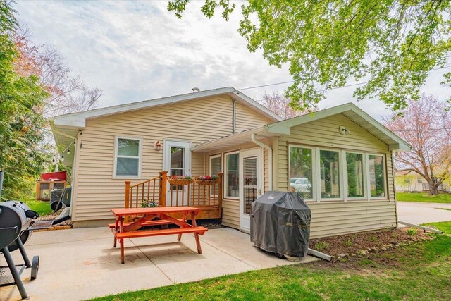 back of house featuring a patio area