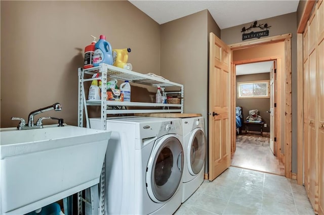16187 Secluded Ln, Gordon, WI 54838 - laundry room with washing machine and dryer, a sink, and laundry area