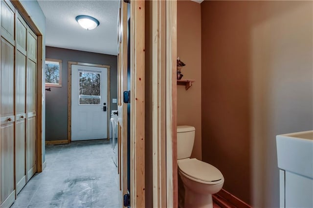 16187 Secluded Ln, Gordon, WI 54838 - bathroom with baseboards and toilet