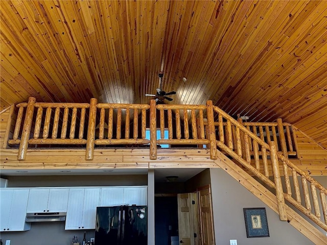 16187 Secluded Ln, Gordon, WI 54838 - room details featuring freestanding refrigerator, ceiling fan, wood ceiling, and under cabinet range hood