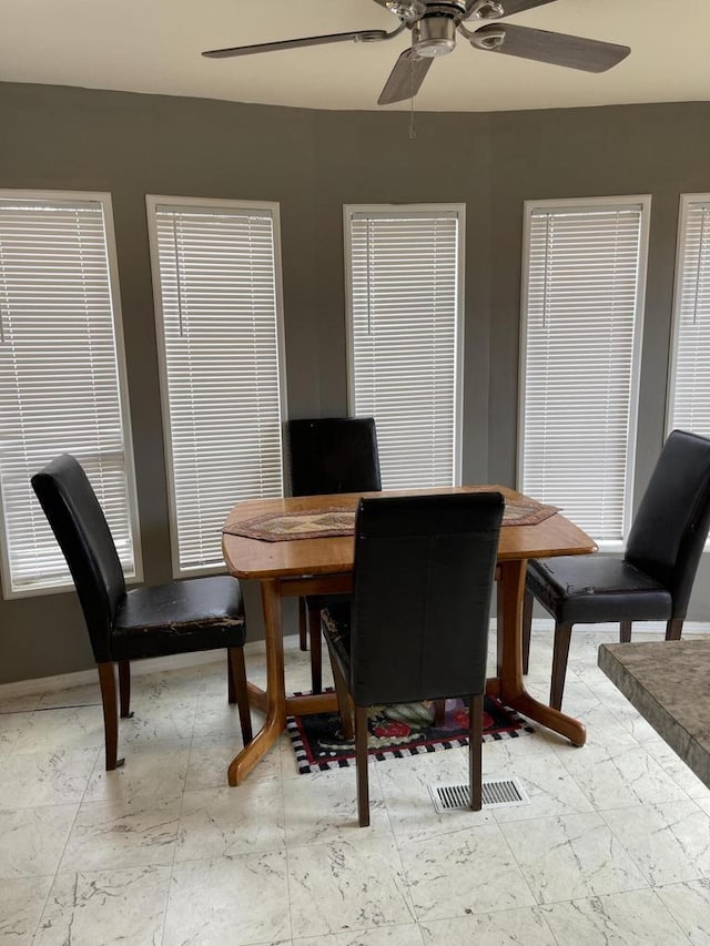 dining area featuring ceiling fan
