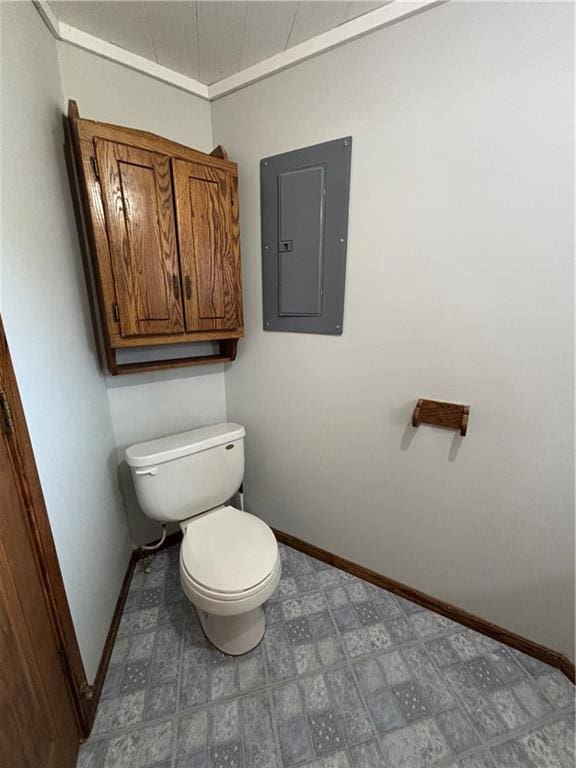 18196 200th St, Jim Falls, WI 54748 - bathroom featuring electric panel, toilet, and baseboards