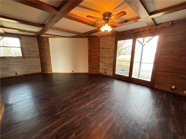 18196 200th St, Jim Falls, WI 54748 - spare room with a ceiling fan, wood walls, wood finished floors, coffered ceiling, and beam ceiling