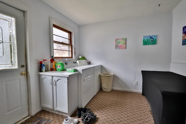 203 S Main St, Deerfield, WI 53531 - laundry room with washing machine and clothes dryer, baseboards, and light colored carpet