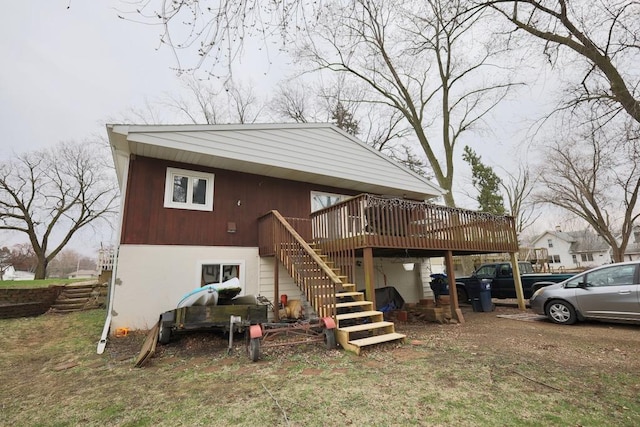 203 S Main St, Deerfield, WI 53531 - back of house with stairway and a wooden deck