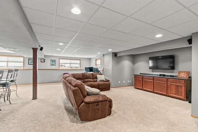 living area featuring a healthy amount of sunlight, carpet flooring, and recessed lighting