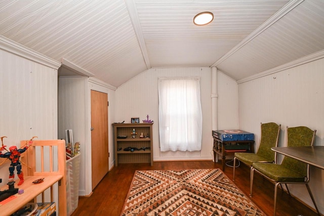sitting room featuring vaulted ceiling and wood finished floors