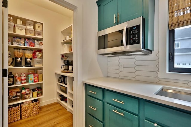 pantry featuring a sink