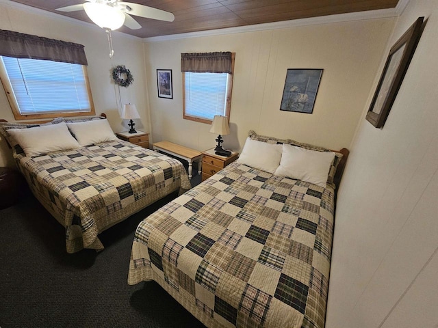 bedroom with a ceiling fan and ornamental molding