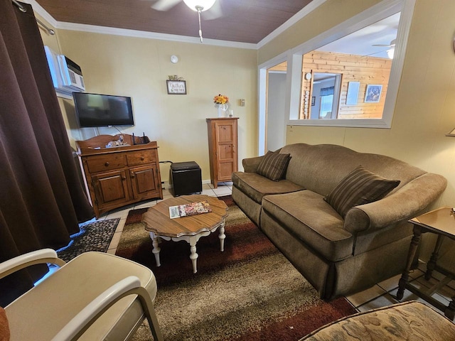 living area with a ceiling fan and ornamental molding