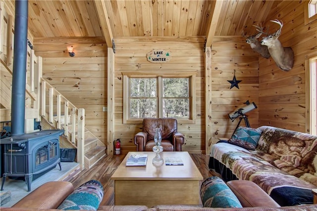 5044 Clayton Rd, Winter, WI 54896 - living area with wooden walls, wood finished floors, and wood ceiling