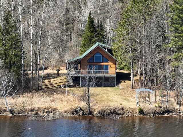 5044 Clayton Rd, Winter, WI 54896 - back of property featuring a forest view and a water view