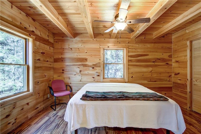 5044 Clayton Rd, Winter, WI 54896 - bedroom with beam ceiling, wooden ceiling, and multiple windows