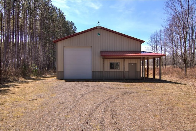 5044 Clayton Rd, Winter, WI 54896 - detached garage featuring driveway