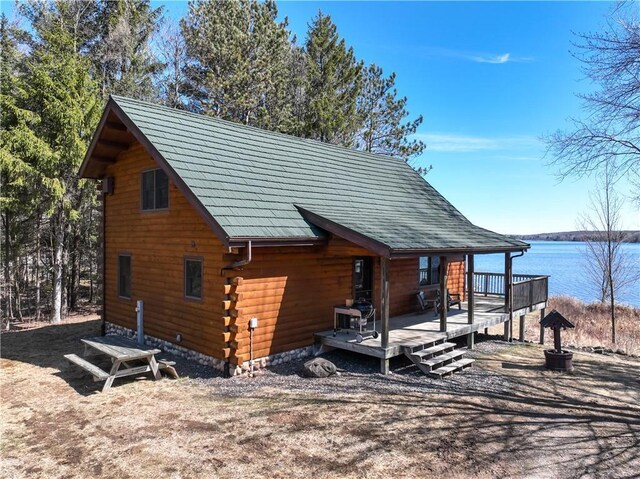 5044 Clayton Rd, Winter, WI 54896 - view of side of home with a deck with water view