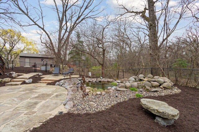 2555 W Deer Path Trl, Janesville, WI 53545 - view of yard with a fenced backyard and a patio