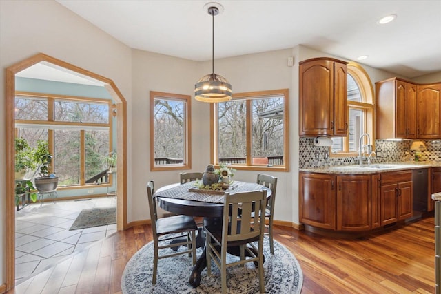 2555 W Deer Path Trl, Janesville, WI 53545 - dining space with recessed lighting, light wood-style flooring, and baseboards