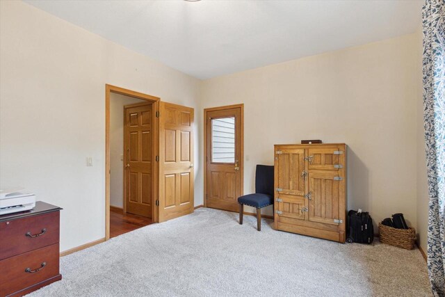 2555 W Deer Path Trl, Janesville, WI 53545 - living area with baseboards and carpet flooring