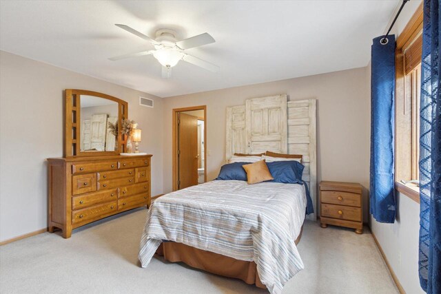 2555 W Deer Path Trl, Janesville, WI 53545 - bedroom with ceiling fan, visible vents, baseboards, and light carpet