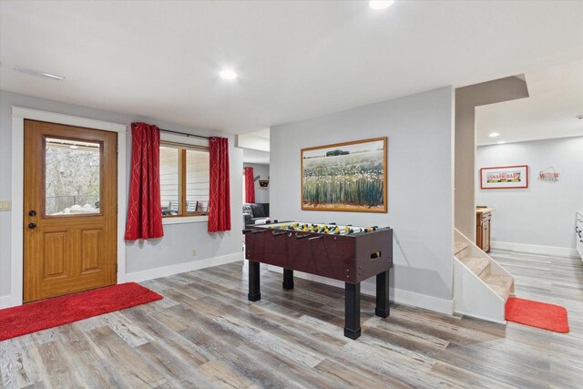 2555 W Deer Path Trl, Janesville, WI 53545 - playroom with baseboards, wood finished floors, and recessed lighting