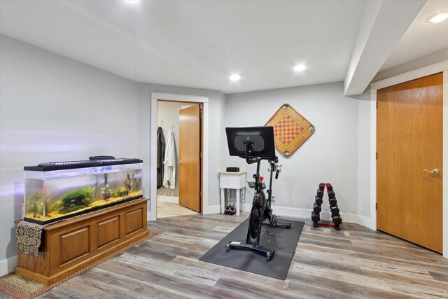 2555 W Deer Path Trl, Janesville, WI 53545 - workout area with baseboards, wood finished floors, and recessed lighting