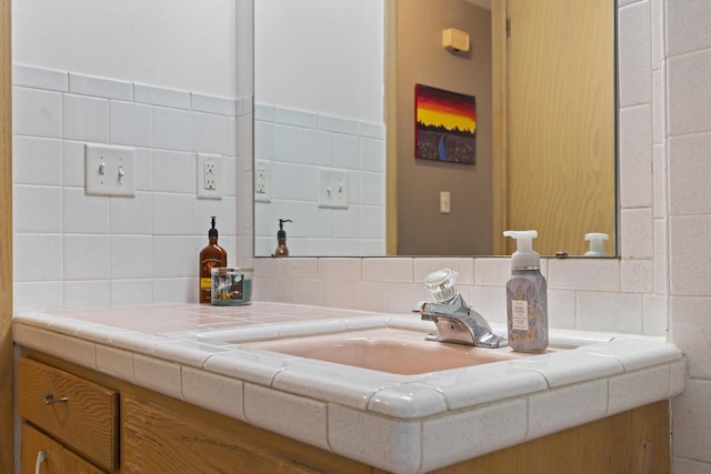 bathroom featuring backsplash and vanity