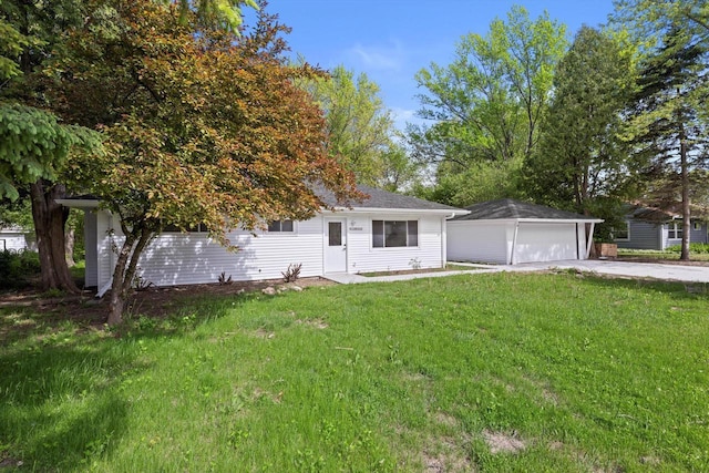 W160N9696 Colonial Dr, Germantown, WI 53022 - view of front of house with a front lawn and a detached garage