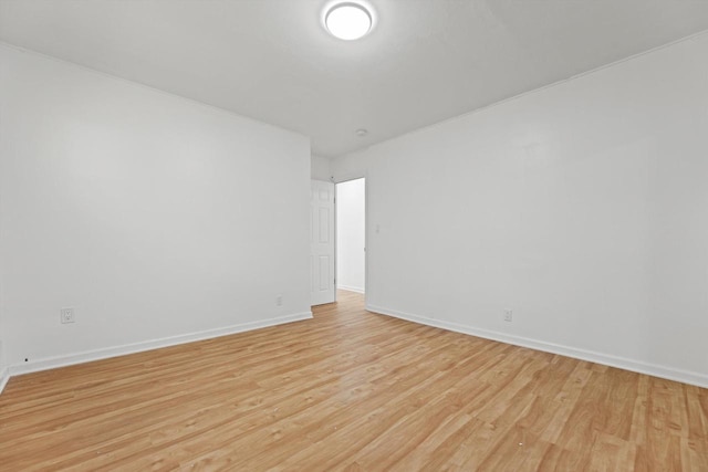 W160N9696 Colonial Dr, Germantown, WI 53022 - unfurnished room with light wood-style flooring and baseboards