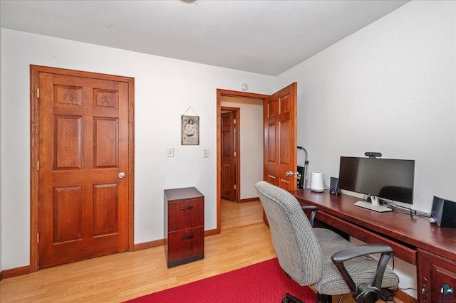 W7604 Sleepy Eye Rd, Minong, WI 54859 - office area featuring baseboards and light wood-style floors